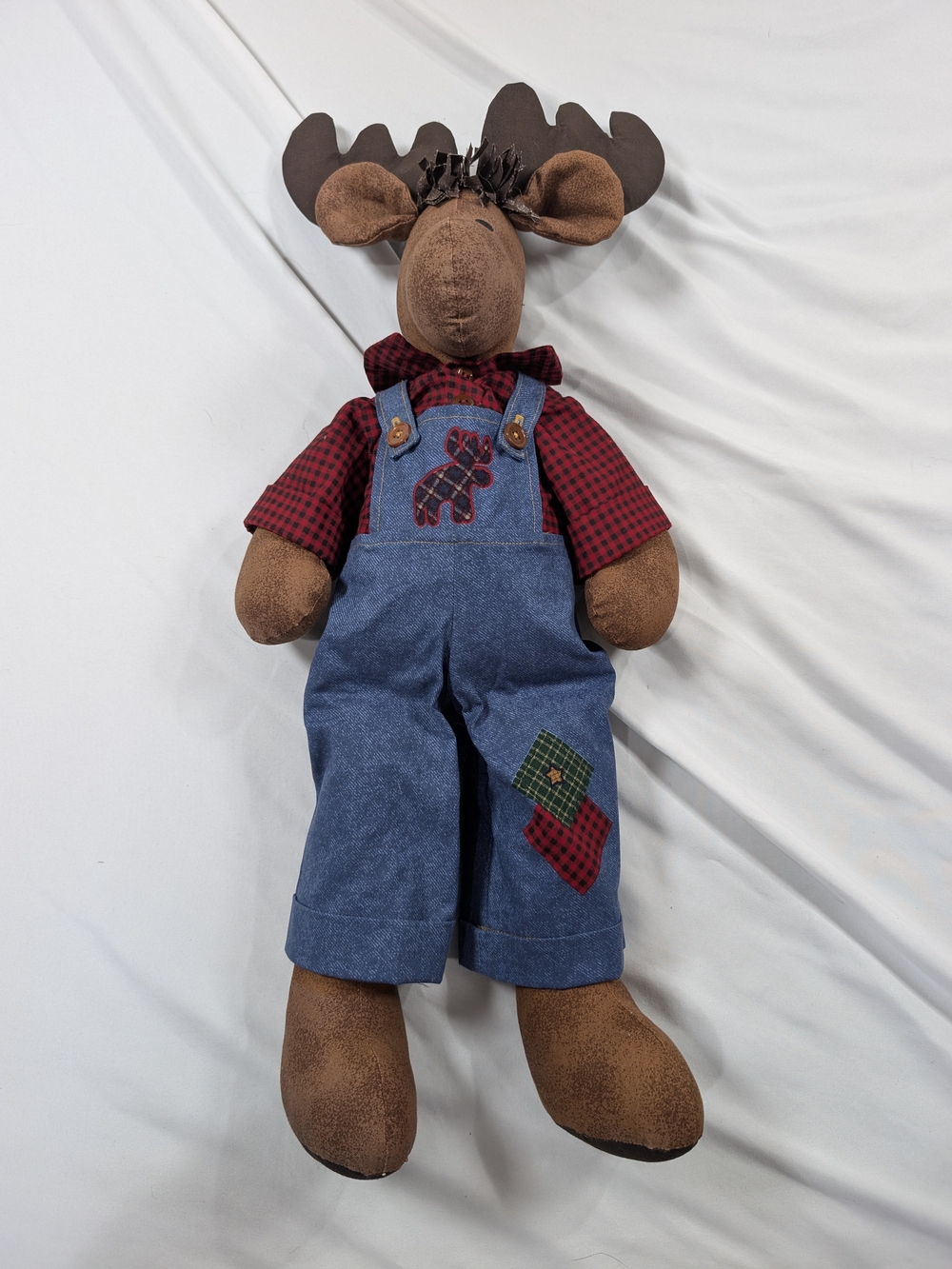 Fabric Moose Wearing Denim Overalls in Blue with Red Plaid Detail
